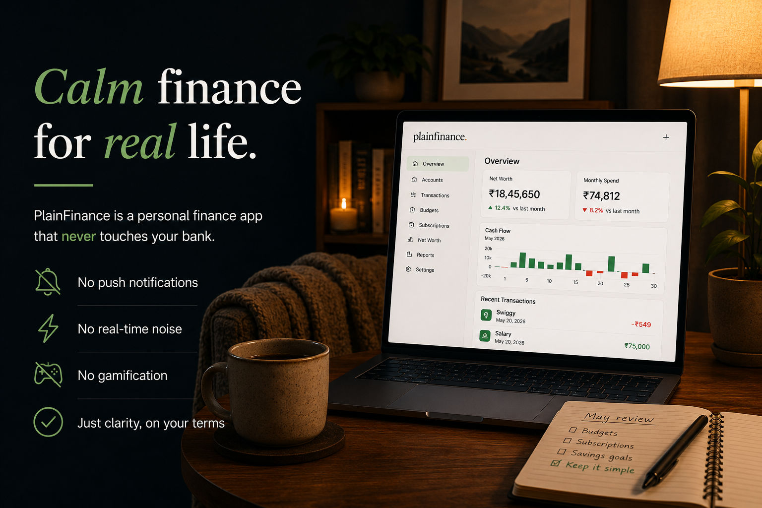 PlainFinance dashboard open on a laptop in a lamp-lit room at night, beside a 'May review' notebook with 'Keep it simple' checked off. Tagline reads 'Calm finance for real life.'